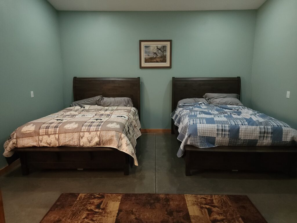 Second bedroom in the Main Lodge with queen beds