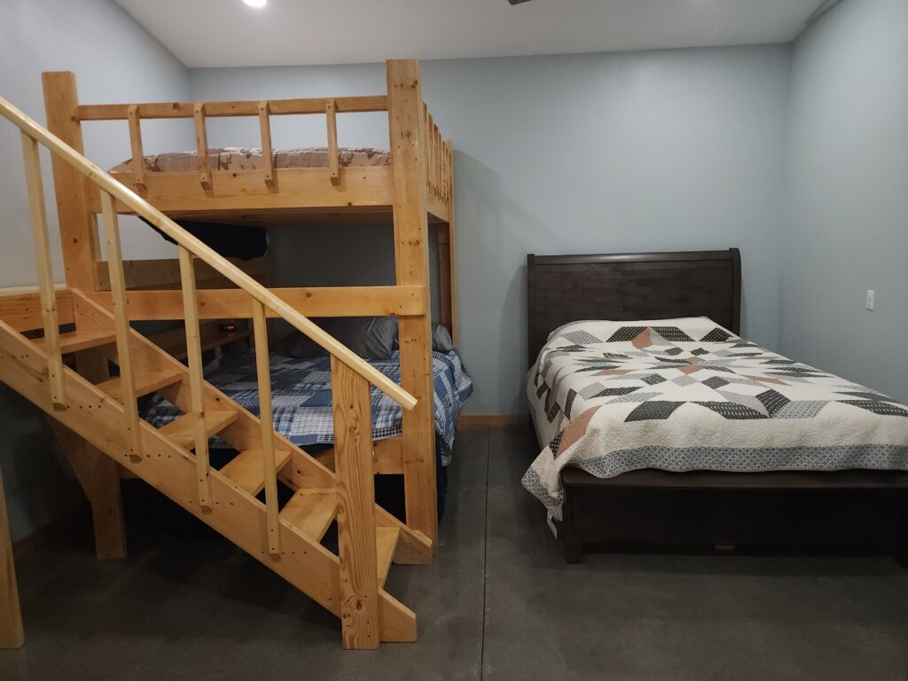 Sleep comfortably with a walk-up loft bed in the Main Lodge
